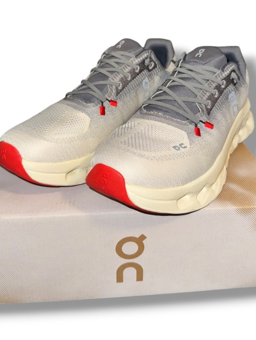 On Running Men's Grey Cream Sneakers with Red Accents Size 10